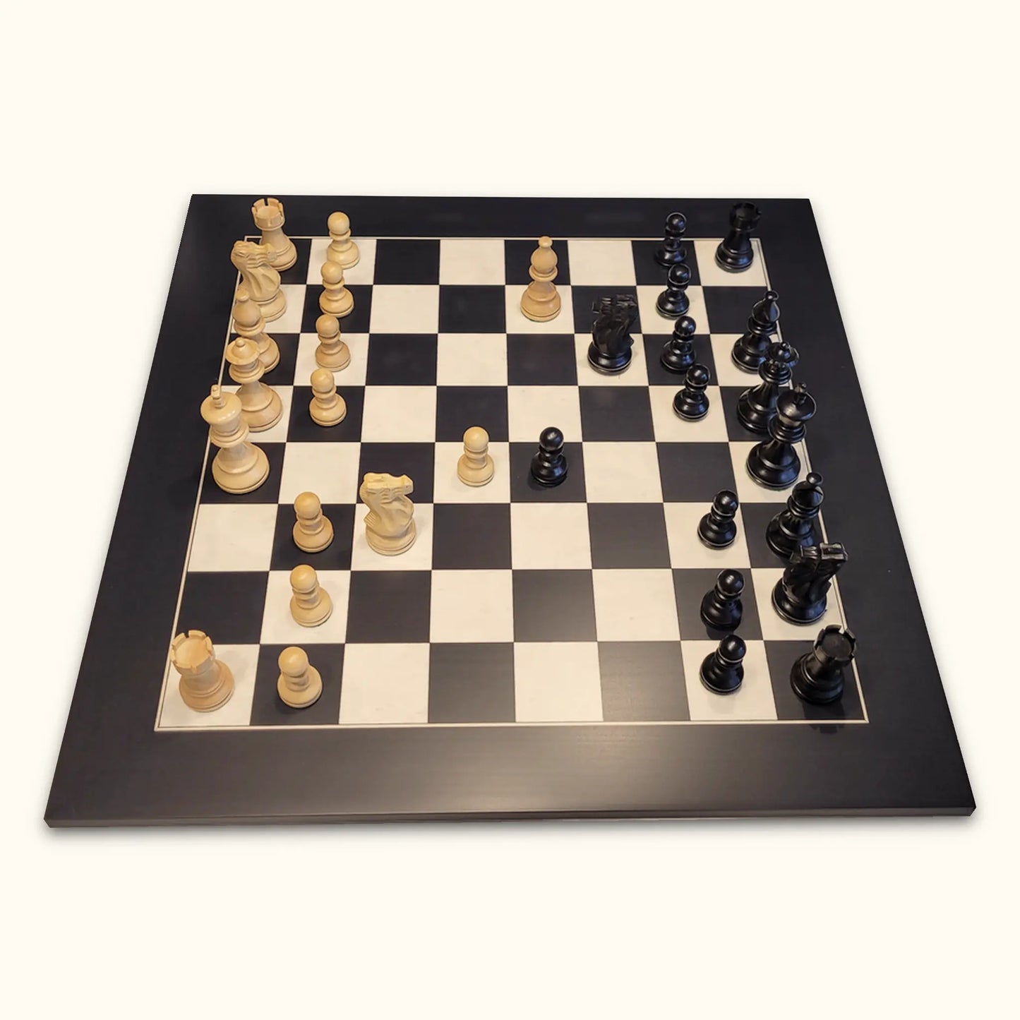 Chess pieces American Staunton ebonized on black deluxe chessboard side