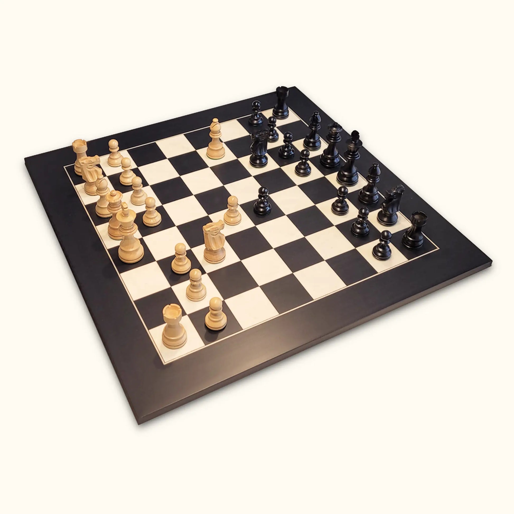 Chess pieces French Staunton ebonized on black deluxe chessboard diagonal