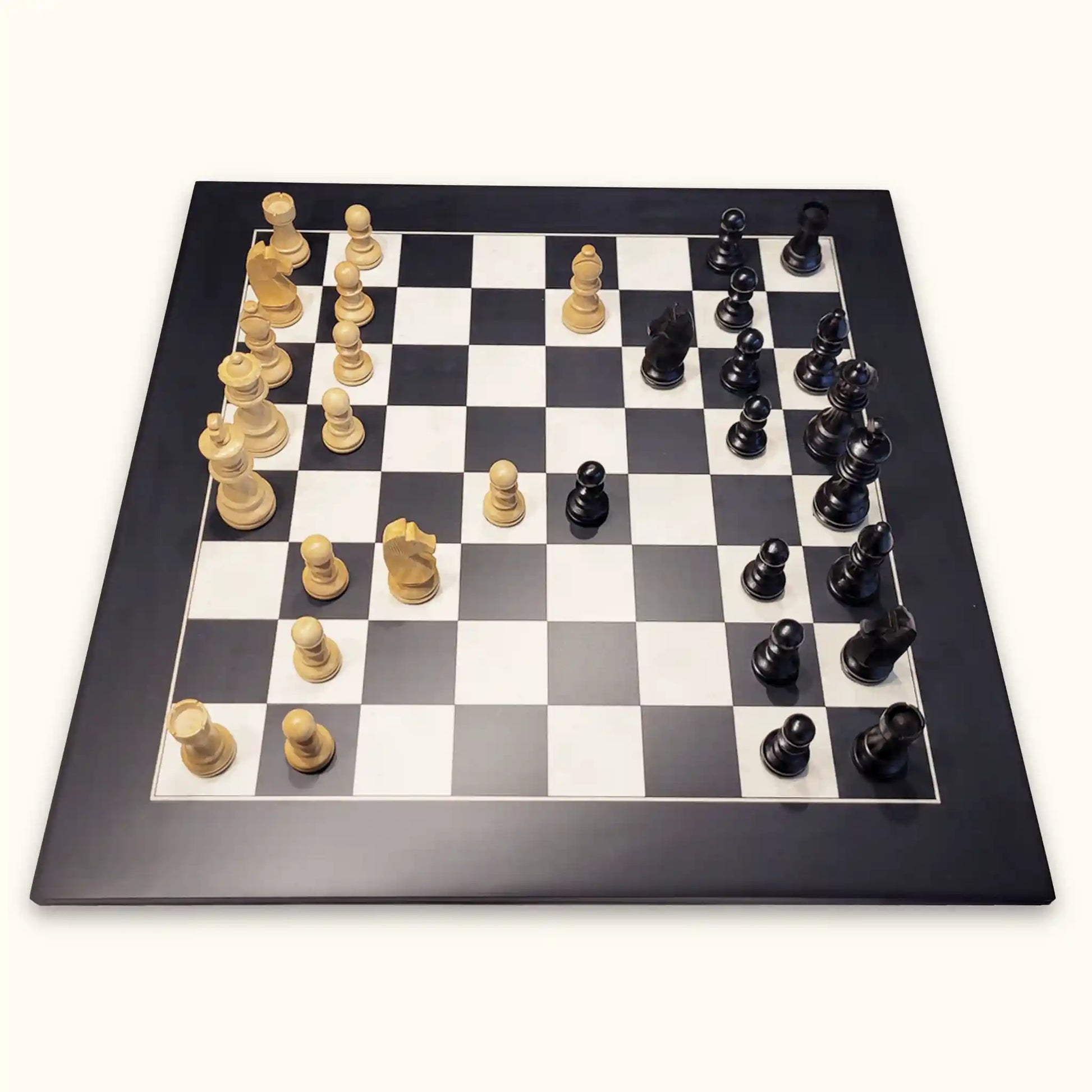 Chess pieces german knight black on black chessboard side