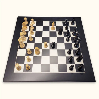 Chess pieces german knight black on black chessboard side