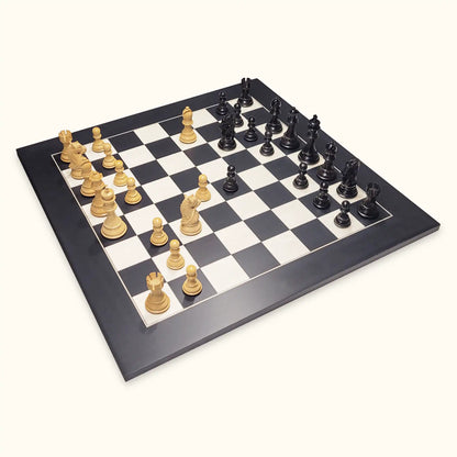 Chess pieces kings bridal ebonised on black chessboard diagonal