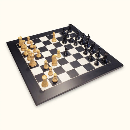Chess pieces oxford ebonised on walnut chessboard diagonal