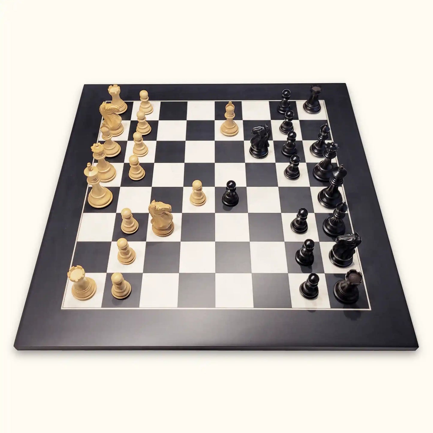 Chess pieces supreme black on black chessboard side